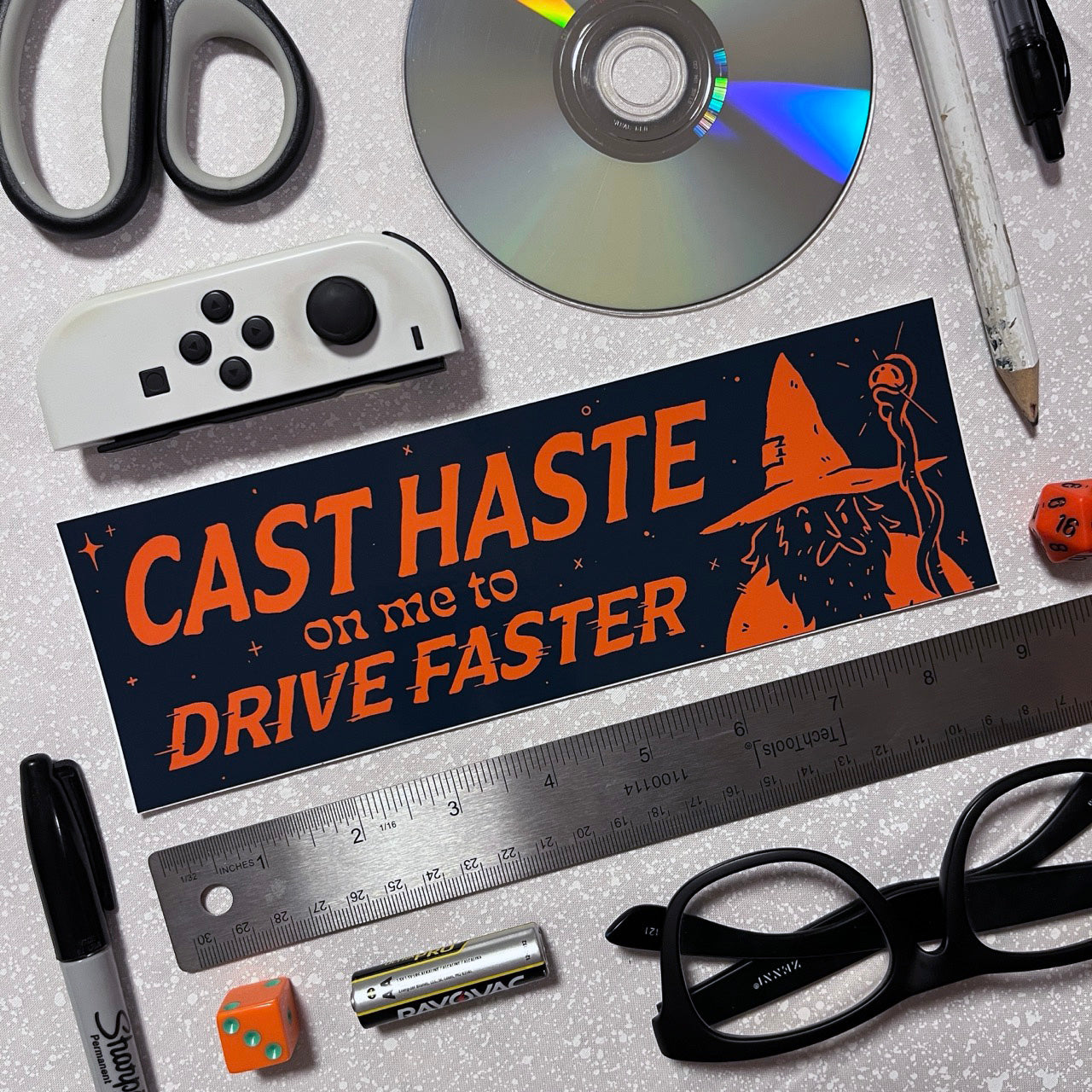 Bumper sticker with wizard and Cast Haste on Me to Drive Faster text