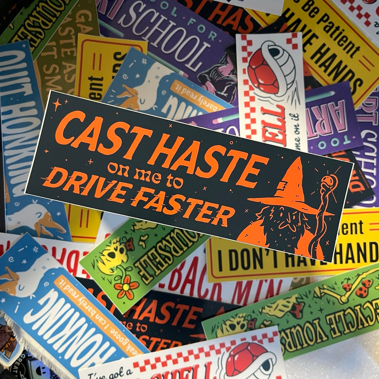 Bumper sticker with wizard and Cast Haste on Me to Drive Faster text
