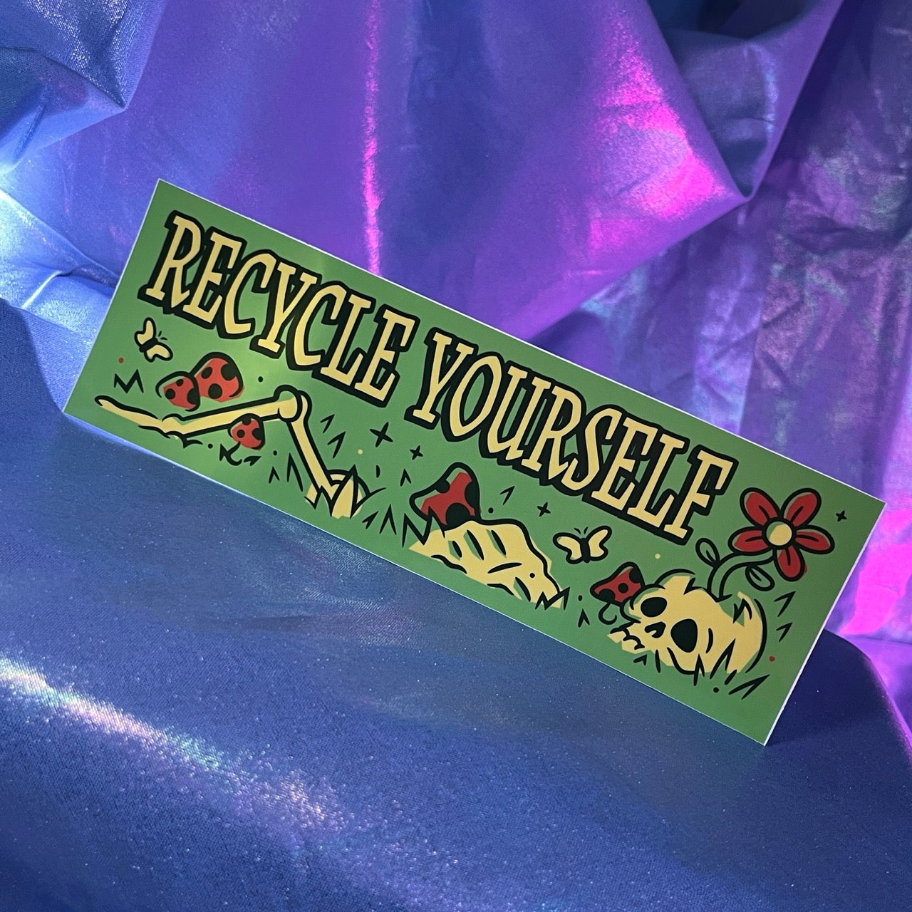 Bumper sticker with skeleton says Recycle Yourself